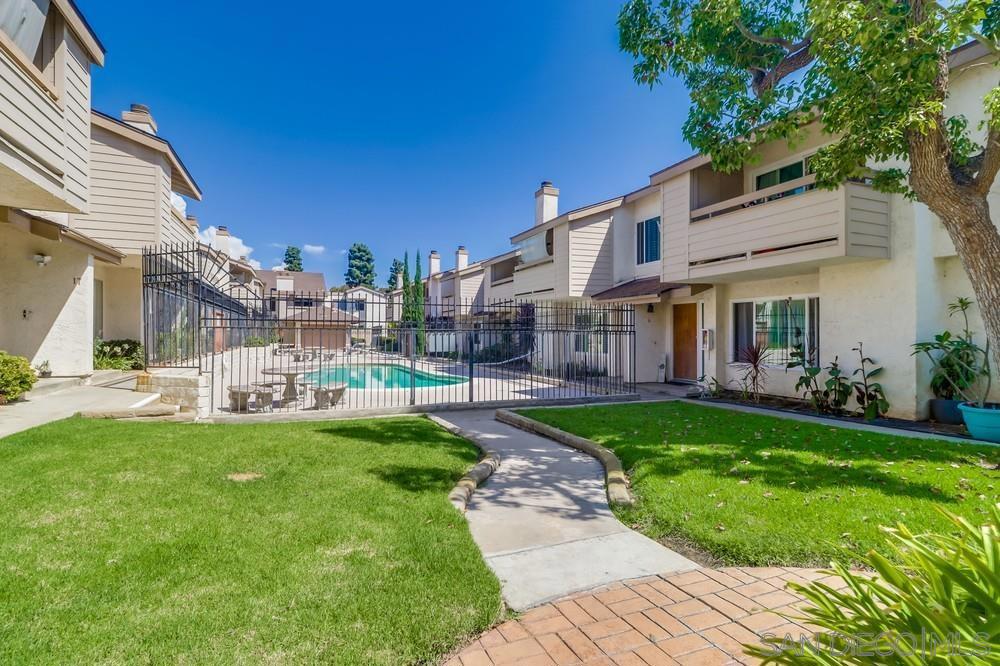 This move-in-ready residence blends modern upgrades with everyday comfort. Step inside to find a bright, open layout featuring a fully upgraded kitchen, complete with sleek finishes and modern appliances. Convenience is built in with an in-unit washer and dryer, central A/C and heating, and a private primary suite with its own full bathroom. Enjoy your morning coffee on the balcony or host gatherings on your private patio. You’ll love the easy access to major freeways, shopping centers, top-rated restaurants, and schools, making daily commutes and errands a breeze. This home delivers the perfect balance of security, comfort, and convenience two assigned carport parking spots with door that leads right into unit's patio. Also, two small storage units at carport