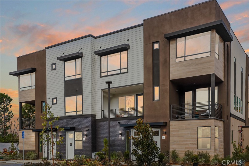 NEW TOWNHOME in a GATED community by Bonanni Development in Stanton, close to Rodeo39 and the 22 Freeway. Three bedrooms and three baths with one bedroom off of the spacious great room. This location has a partial view of our community park. This plan 2A is light and bright with white cabinets throughout and white quartz countertops. The great room design flows into the kitchen with a generous island and large, private deck. Plus stainless steel dishwasher and gas range. Upstairs are two additional en-suite bedrooms with walk-in-closets and a convenient laundry area. Built with state of the art technology, high speed wiring throughout, plus new appliances, cabinets and flooring. SOLAR PANELS INCLUDED IN PRICE!
This gated community will have three unique parks for homeowners to enjoy including a private dog park!
Photos are of the models.