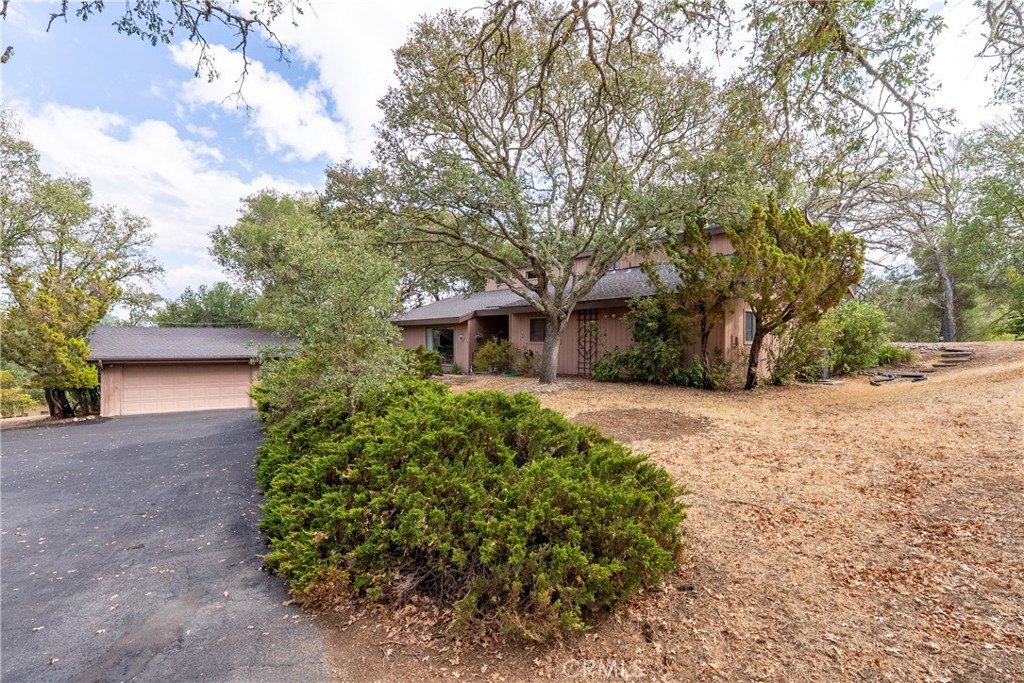 Hard-to-find Westside opportunity in the desirable 3F Meadows neighborhood! This well-maintained home is nestled among beautiful trees on a spacious, usable 2 acre parcel that offers room to create the lifestyle you want. Inside, the vaulted ceilings and wood-burning fireplace insert in the great room set a warm, inviting tone. Two loft areas provide flexible space for an office, hobby nook, or even extra guests. The primary suite includes a walk-in closet, while the covered back patio is perfect for enjoying peaceful evenings outdoors. Ready for your personal updates, this property combines location, space, and potential in one of the most sought-after areas on the Westside.