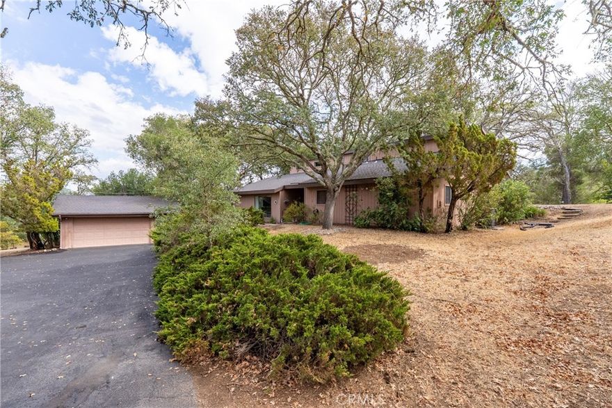 Hard-to-find Westside opportunity in the desirable 3F Meadows neighborhood! This well-maintained home is nestled among beautiful trees on a spacious, usable 2 acre parcel that offers room to create the lifestyle you want. Inside, the vaulted ceilings and wood-burning fireplace insert in the great room set a warm, inviting tone. Two loft areas provide flexible space for an office, hobby nook, or even extra guests. The primary suite includes a walk-in closet, while the covered back patio is perfect for enjoying peaceful evenings outdoors. Ready for your personal updates, this property combines location, space, and potential in one of the most sought-after areas on the Westside.