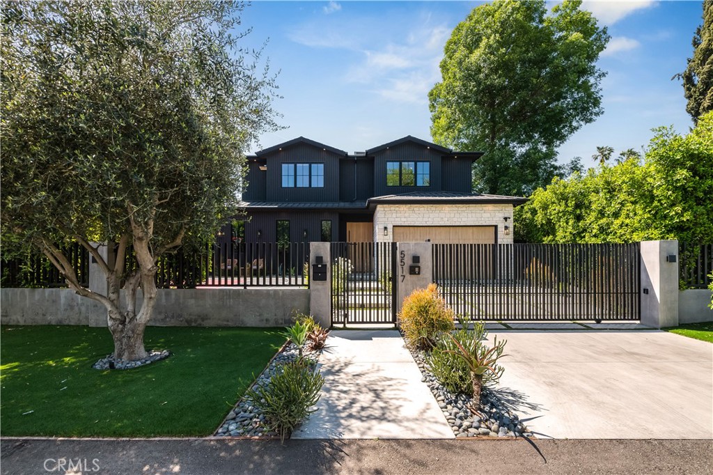 Serene beauty in Sherman Oaks neighborhood ! Offered fully furnished, this is a wonderful location on a peaceful street, a fully gated property offers beauty, privacy, and a layout with universal appeal.
A luxurious family home, this unique property offers a the wonderful combination of great comfort and with warm finishes throughout. Everyone can enjoy the experience of playing basketball in the fully gated front yard, where neighbors their walk dogs and provide a real neighborhood feel. Open floor plan offers a comfortable primary living area with open chefs kitchen, an abundance of island seating, and top-of-the-line appliances. A Wall of glass sliders invite you to an expansive and private entertainers backyard, with plenty of play and relaxing space by the refreshing pool and spa. Gorgeous dining area with sliders open to gracious outdoor patio. And an outdoor shower !
The first floor living space is completed with a gracious yet cozy theatre and welcoming bar area.
An elegant staircase leads to a luxurious primary suite complete with Private balcony, and a primary bath so relaxing with every amenity —you will never want to leave. Three secondary bedrooms, all gracious, formidably sized and en suite, along with an upstairs laundry room complete this spacious floor.
Did we mention there's even a mini gym in the garage?
This home is the ultimate is safety and security ! Control 4 makes operating all systems a breeze, fully gated, controlled entry, multiple cameras, alarm system all designed to ensure peace and privacy.
This is an exceptional home nestled in a wonderful neighborhood in Los Angeles, convenient to restaurants the freeway, and a number of acclaimed private, and public schools.
***Owners prefer a long-term lease but are open to considering short-term options.