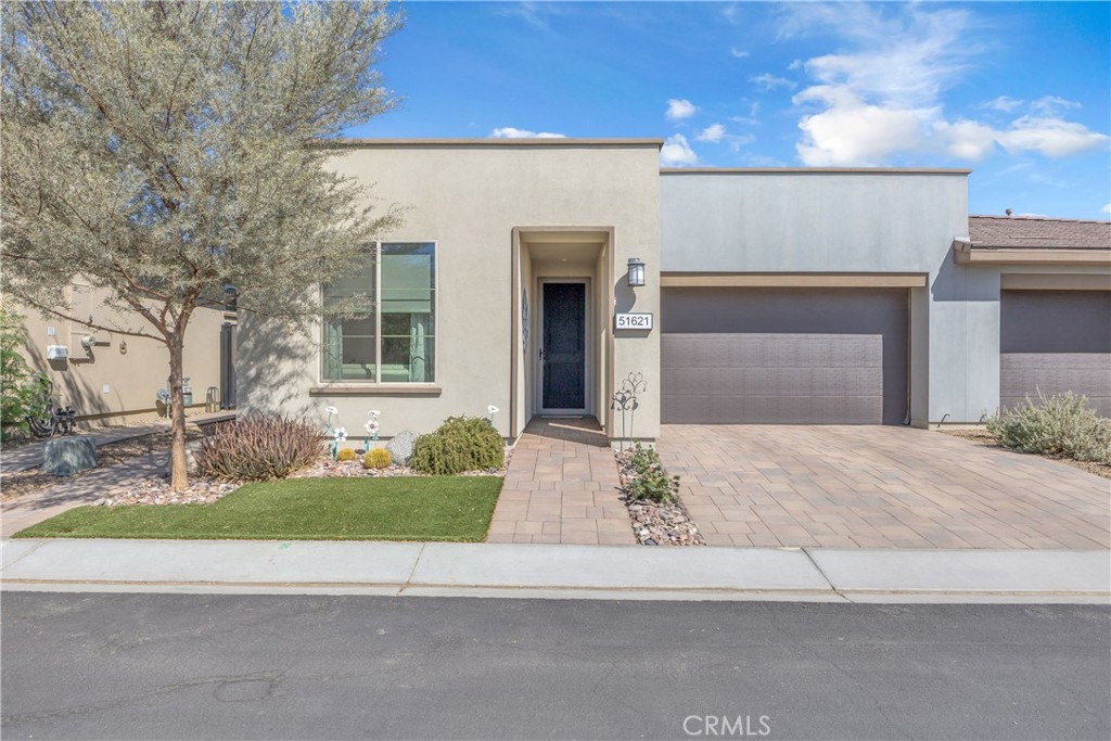 Beautiful home in the sought after community of Trilogy Polo. Built in 2021, this stylish 2-bedroom, 2-bathroom home offers a seamless blend of modern design and low-maintenance living in the Trilogy Polo community. With 1,342 square feet of intelligently designed space, the open-concept layout features a light-filled living area, a modern kitchen with stainless steel appliances, and a smart flex space perfect for a home office or craft area. Located in a prime spot just across from a scenic walking park, the home has been recently upgraded with brand new luxury flooring and baseboards, adding a fresh, high-end finish throughout. Exceptional natural light and easy flow make this home both welcoming and functional.