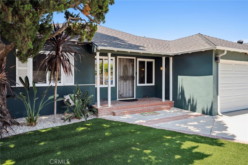 Welcome to 6451 Riverton Ave, North Hollywood!
This charming and meticulously maintained 2-bedroom, 1.5-bath home offers 1,140 sq ft of comfortable living space on a generous 6,750 sq ft lot.
Step inside to find a separate dining area, a spacious family room with a cozy fireplace, and a beautifully remodeled kitchen featuring an island, quartz countertops, and shaker cabinets. The home is updated with newer paint, durable flooring, recessed lighting, and modern systems including a newer roof, HVAC, hot water heater, and Nest system. It’s also wired with ethernet throughout.
Enjoy sustainable living with a solar system that transfers to the new owner and a 240-volt EV charging setup in the garage.
The large backyard is perfect for outdoor living, complete with a patio cover, grassy area, and fruit trees. The garage was previously converted (unpermitted) and has since been restored, featuring finished walls, full insulation, and a half bath—offering future ADU potential (buyer to verify).
Centrally located near Burbank, shopping, restaurants, and the 170 Freeway—this home is ready for you to make new memories!