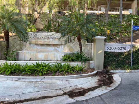 Photo of 5210 Premiere Hills Drive #230, Woodland Hills, CA 91364 (MLS # 226003822)
