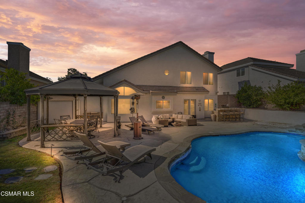 Stunning Moorpark home with 3 bedrooms, 2.5 baths, and just under 2,200 sq ft on an 8,015 sq ft lot, with a 3-car garage. Beautifully remodeled kitchen, three upgraded baths, and new wood-like flooring. The spacious primary suite features two custom walk-in closets and a spa-style bathroom with an oversized shower. Enjoy a private backyard oasis with pool/spa, custom BBQ with sink & fridge, a gazebo, and lush landscaping. Energy-efficient upgrades include a Tesla battery charger, owned solar, water filtration, and a newer roof. Located in one of Moorpark's most desirable neighborhoods, this property is perfect for those seeking a move-in-ready home.
