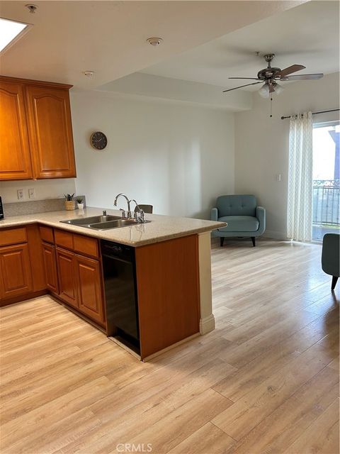 Photo of 17888 Alburtis Avenue #B117, Artesia, CA 90701 (MLS # OC26050739)