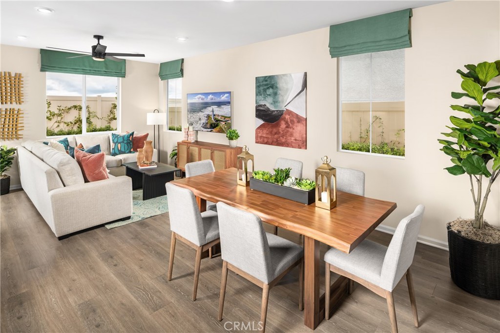 This professionally designed model home in the gated Iris Park community of Moreno Valley is move-in ready and priced in the $500s — with fantastic seller incentives available. Ask about limited-time incentives and flexible financing options that may help to reduce closing costs or monthly payments. If you’ve been renting and dreaming of a home that’s fully finished, low maintenance, and just feels “done,” this is the one. The Lansing floor plan offers 4 bedrooms, 2.5 bathrooms, a 2-car garage, and an open-concept layout that’s both comfortable and functional. The first floor features a spacious Great Room and dining area that flow into a modern kitchen with a large island, quartz countertops, upgraded cabinetry, and walk-in pantry. Upstairs, you’ll find all four bedrooms, including a generously sized Primary Suite with dual sinks, a walk-in shower, and a large walk-in closet. A flexible loft adds extra space for a home office, media zone, or play area. The laundry room is conveniently located upstairs near all bedrooms. As a professionally curated model home, it includes designer-selected finishes, upgraded flooring, and completed front yard landscaping — so you don’t have to worry about a thing. Just bring your furniture and move in. A full Solar System is Included!! Built by Beazer Homes, the nation’s #1 builder of DOE-certified Zero Energy Ready Homes, this home is designed for energy efficiency, long-term savings, and improved indoor air quality with Indoor Air Plus certification. Please note - the pictures are of the actual home!
