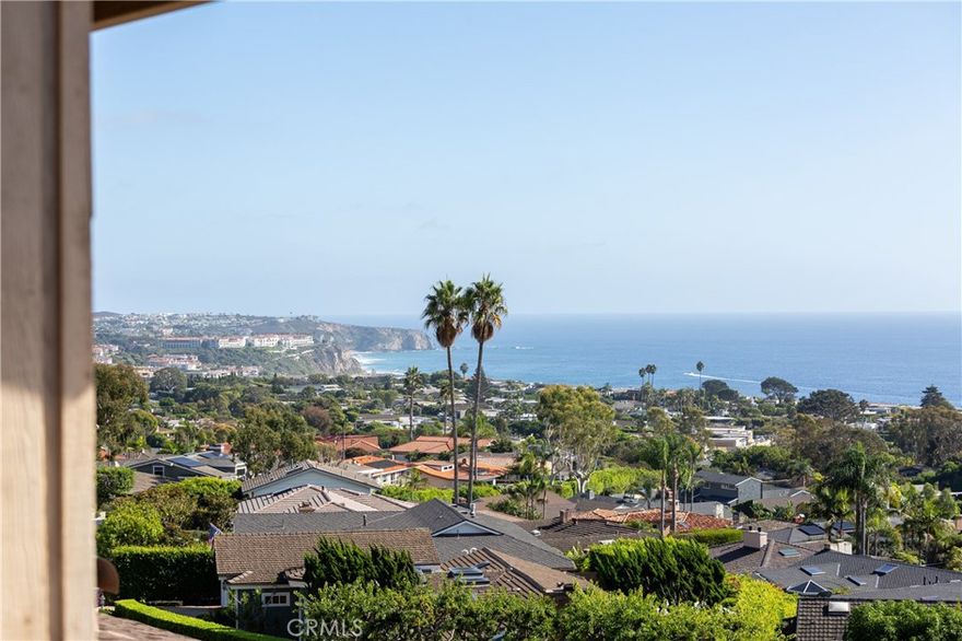 A Hal Lambert architectural study, 7 N Vista De La Luna sits above the coastline in guard-gated Three Arch Bay with end-to-end Pacific views. The 4-bed, 2.5-bath layout centers on an open living/dining area that steps onto broad view decks—great airflow, clean sightlines, easy indoor–outdoor use. The primary suite functions as a private lookout with wraparound ocean vistas. Three secondary bedrooms offer flexibility for guests, office, den, or studio. Multiple patios and terraces extend the living space for morning coffee, alfresco meals, or sunset gatherings. Three Arch Bay adds private beach access, 24-hour security, tennis courts, a clubhouse, and an active community event calendar—one of Laguna’s most established coastal enclaves. Ideally positioned near top-rated schools, standout dining and shopping, premier golf, and five-star resorts, the location is second to none. And with a thoughtful refresh—cosmetic updates or selective upgrades—the property is poised to elevate even further.