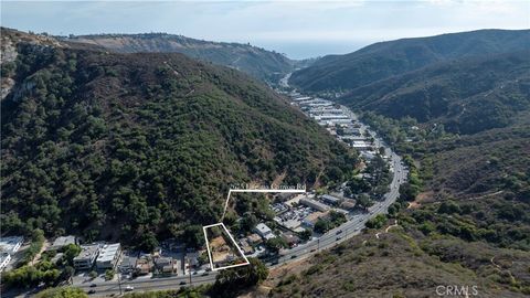 Photo of 2675 Laguna Canyon Road Rd, Laguna Beach, CA 92651 (MLS # OC25186184)