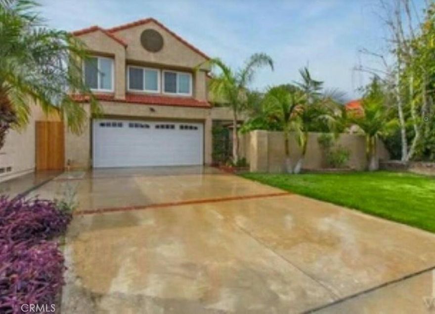 Welcome to this beautiful customized 4 Bedroom, 2 1/2 Bath home.  The home is located on a quiet lot that backs up to Paul Griffin Park.  You enter the home through a private courtyard.  As you enter the home you walk into the formal living room with vaulted ceilings and a cozy fireplace.  The home has upgrades throughout, but the kitchen is what stands out.  The kitchen remodel includes plenty of cabinet space, recessed lighting, granite counter tops, and upgraded stainless steel appliances.  The home features a main floor bedroom with vaulted ceilings and a slider out to the quiet private backyard.  The upstairs features three bedrooms and two full baths.  The master suite has crown molding and features a remodeled bath that feaures a double sink and custom shower.  The backyard has a custom patio cover and beautiful hardscape.The home is close to shopping, freeways, parks, and community college.  Conveniently close to the Metro station.