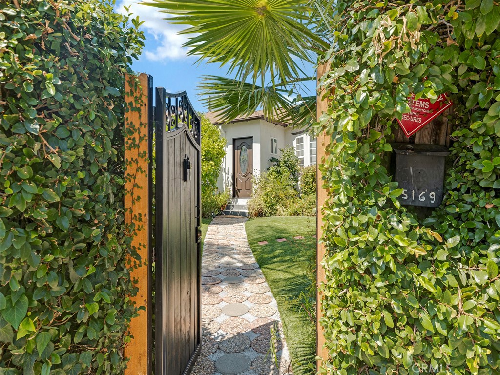 This charming 3-bedroom, 2-bath home located south of the Boulevard in Encino offers over 1,500 square feet of comfortable living space. The remodeled kitchen features modern appliances, sleek countertops, ample cabinetry and eating area, making it a delightful space for culinary enthusiasts. The open-concept layout seamlessly connects the kitchen to the dining and living areas, perfect for entertaining or just sitting home relaxing. This home features newer central air and heat, newer roof, 2 electrical panels one for the house and one for the kitchen, and wood floors. The exterior features automatic sprinklers, motion detected lighting and electric driveway gate with remote. Nestled in a desirable neighborhood, this home is conveniently situated close to Ventura Boulevard, providing easy access to an array of shopping, dining, and entertainment options. You will appreciate the proximity to schools and houses of worship, while nearby parks offer recreational opportunities for outdoor activities. With quick access to the freeway, commuting to surrounding areas is a breeze. This home is a fantastic blend of comfort, convenience, and modern amenities, ideal for anyone looking to enjoy the vibrant Encino lifestyle.