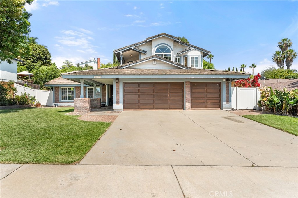 Welcome to your dream home in the highly sought-after Canyon Crest neighborhood—where comfort, space, and style blend effortlessly in this beautifully maintained four-bedroom (plus office), three-bathroom residence. Perfectly situated on a spacious 0.28-acre lot, this property offers the ideal setup for multigenerational living, featuring two generously sized primary suites—one conveniently located on the main floor and another tucked away upstairs for added privacy. From the moment you step inside, you’ll feel the warmth of a thoughtfully designed layout that’s perfect for both everyday living and entertaining. The downstairs primary suite is ideal for guests, in-laws, or anyone who prefers single-level living, while the upstairs suite offers a peaceful retreat with its own private balcony, walk-in closet, and ensuite bath. The home’s living areas are filled with natural light and tasteful finishes, flowing seamlessly from formal living and dining rooms to a cozy family room with a wood-burning fireplace. The kitchen is a chef’s delight, featuring granite countertops, updated appliances, and ample cabinetry for hosting and meal prep. A dedicated office provides the perfect space for remote work, study, or creative pursuits. Step outside into your private backyard oasis, where a sparkling pool and spa invite year-round enjoyment, with an adjacent pergola - the perfect location for shaded relaxing or an outdoor firepit. The upper deck offers a peaceful spot to enjoy sunset views. A variety of fruit trees add both charm and function to the landscape, and the expansive lot offers room to garden, play, or expand. The three-car garage ensures plenty of space for vehicles, hobbies, and storage. Located near top-rated schools, shopping centers, and the Canyon Crest Country Club, this home combines the best of suburban living with the convenience of nearby amenities. Whether you're accommodating extended family or simply seeking flexible space for your lifestyle, this Canyon Crest gem truly checks every box. Don’t miss your opportunity to own this versatile, poolside retreat in one of Riverside’s most desirable communities!