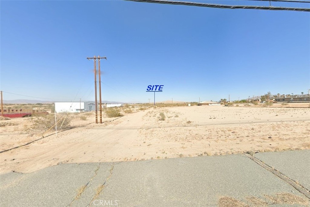Flat land, measures 165ft x 165ft totaling 27,225sf lot, located only 1200ft from paved Adobe Rd, electricity and water located about 500+/-ft from subject property, lot and located next and East of the following property address: 5157 Adobe Rd, Twentynine Palms, CA 92277, withing the city and only 1.5 miles from downtown 29 palms for all amenities and shopping needs. Google maps coordinate for the sign on property are: 34.159111, -116.050028, Lines demarcating boundaries are approximate and not surveyed, buyer and buyer’s agent to verify utilities, zoning & exact boundary lines to satisfy yourselves with the property