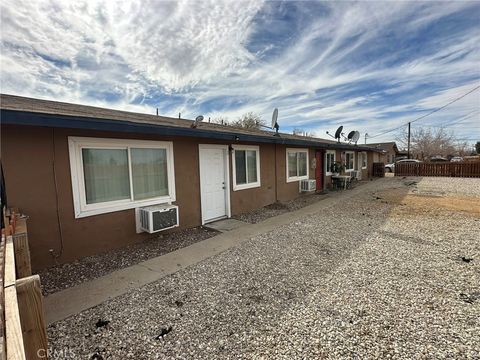 Photo of 11895 White Avenue, Adelanto, CA 92301 (MLS # IV25085013)