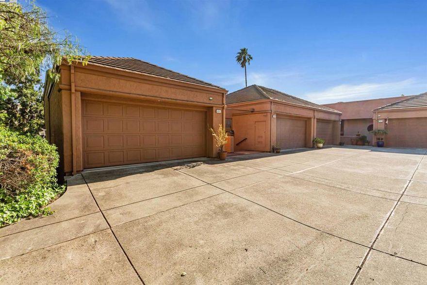 Fantastic Lakeview! End Unit Townhome Located in the Private Gated Community of Canyon Lake. This beautifully updated 2-bedroom suite style with 2.5-bath lakeview townhome offers peaceful surroundings, abundant natural light, and comfortable living in one of the East Bay’s most desirable gated communities. Prime location—just minutes from City Center, Costco, and Highway 680. Inside, enjoy stylish, newly installed waterproof laminate flooring and plush carpeting. The modern kitchen features a pantry and stainless steel appliances. The home offers a walk-in wine cellar that could also be used as a play room, storage, etc. Hoa amenities are Haz insurance, community pool.
