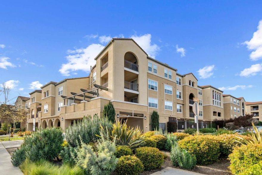 Embrace a lifestyle of unparalleled convenience and comfort in a prime location within this secure complex at The Mission Terrace Community. The open floor plan showcases a kitchen with white cabinetry, stainless appliances and granite countertops that opens to the versatile dining room and living room area. The master suite boasts a walk-in closet, dual sinks and oversized tub. Relax on the covered patio with beautiful views of the pool and courtyard. The condo is well appointed with:  fresh interior paint, new carpet, Inside laundry, recessed lighting and central air conditioning - ensuring year round comfort.  This unit has very easy access to the 2 reserved parking spaces in the secure garage. Mission Terrace offers premium amenities including a heated pool & spa, fully equipped fitness center, yoga studio, children's playground and lush courtyards. Located minutes from top destinations  Levi's Stadium, Rivermark Village & Santa Clara Square Marketplace- an abundance of shopping and dining options . It's near major tech companies and in close proximity to major freeways, making it convenient for commuters and nature lovers can explore nearby parks and the Guadalupe River Trail. Come and discover community living at its best!
