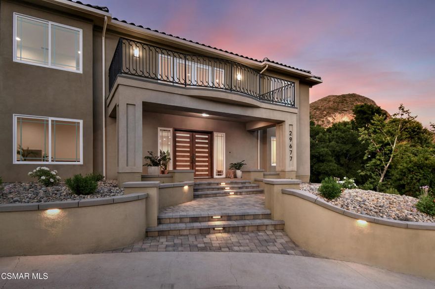 Newly built custom home, nestled along the scenic Mulholland Highway with sweeping views of the Santa Monica Mountains! This newly constructed 2025 estate offers refined living across 1.59 acres of private, horse-zoned land. The 4-bedroom, 5-bathroom residence includes two dedicated offices, soaring 20-foot entry, oak flooring throughout, custom maple and mahogany millwork, and oversized windows that flood the home with natural light. The gourmet kitchen features Wolf appliances, a Sub-Zero refridgerator, quartz countertops, and a walk-in butler's pantry. Enjoy multiple balconies, a mezzanine-style upper walkway, and a spacious primary suite with a ready-for-design walk-in closet. Additional features include a 1,200 sq. ft. garage, 800 sq. ft. finished basement with powder room, RV parking, spa and pool with waterfalls, dual-zone HVAC, pre-wired solar, and full fire safety systems. Built to the latest seismic and fire codes, the home rests securely on bedrock. Located just 10 miles from the Pacific Coast Highway, with top Las Virgenes schools, hiking and biking trails at your doorstep, and iconic spots like The Old Place and Malibou Lake moments away. No HOA! Future development potential make this a rare opportunity in a prime Agoura location.