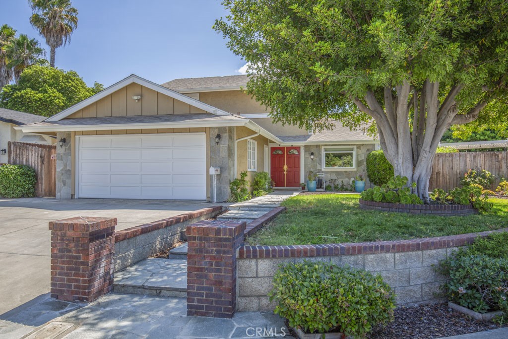 This elegantly upgraded two-story residence offers timeless appeal in a sought-after Lake Forest neighborhood, occupying one of the larger lots in the area. The property includes a two-car garage and ample driveway space suitable for a trailer, RV, or additional vehicles. A spacious double-door entry leads to an open concept living room on the first floor, featuring an upgraded chandelier and gas fireplace. The adjacent dining area also benefits from a modern chandelier.
The newly remodeled kitchen is equipped with soft-close cabinetry, recessed lighting, and an upgraded garden window. Solid wood stairs provide access to the second floor, where you will find a guest bedroom and a generously sized primary bedroom, both with laminate wood flooring and large sliding closet doors. Dual-pane windows are installed throughout the home for energy efficiency and comfort.
The first floor includes a bedroom and an upgraded bathroom. A recently expanded enclosed patio room, approximately 22' x 13', features a split HVAC unit, doggy door, and recessed lighting—perfect for year-round use. An external shed (22' x 4') with a sliding barn door offers convenient extra storage.
The professionally landscaped backyard features a 12' x 12' gazebo with adjustable slats for shade, electrical outlets on both decks—one prepped for a jacuzzi—and an upgraded irrigation system with drip lines and new sprayers for the raised garden. Additional improvements include a cement stairway to the upper terrace, a double-sided wood fence, complete interior re-piping with PEX piping (approximately two years ago), a new light-colored shingle roof with added gutters and downspouts, and a newer Lennox furnace with an air scrubber. The home's exterior has been recently repainted, and the front yard is enhanced by a mature shade tree. The residence is conveniently located near schools, shopping, parks, and freeway access.
Every upgrade has been thoughtfully executed, making this property move-in ready and ideal for a variety of lifestyles. Whether entertaining guests, raising a family, or enjoying tranquil evenings, this home combines functionality and style for comfortable, sophisticated living.