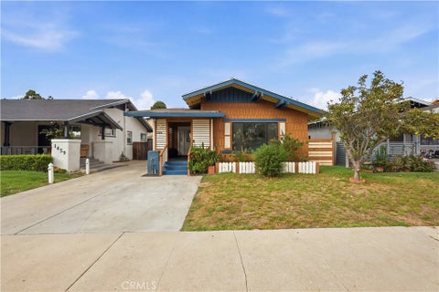 Photo of 1453 W 56th Street, Los Angeles, CA 90062 (MLS # SR26215107)