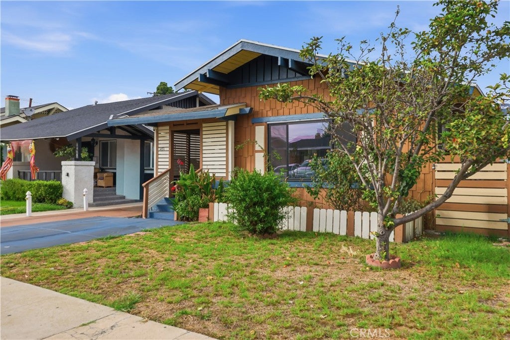 Photo of 1453 W 56th Street, Los Angeles, CA 90062 (MLS # SR26215107)