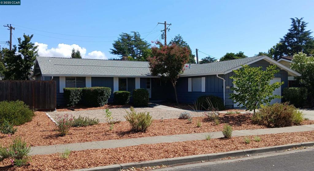Welcome to 1682 Mendocino Drive, a charming mid-century-style home that providesaccess to easy commutes, local summer concerts, farmers' markets at Todos Santos Plaza, schools within walking distance, convenient shopping, weekend adventures, and speedy access to BART, San Francisco, Berkeley, Oakland, and the vineyards of Napa. Enjoy hardwood flooring that flows throughout the house, an en suite master bathroom, year-round comfort provided by central heating and air conditioning, and peace of mind knowing the roof was updated with permits in 2012. The front yard boasts drought-tolerant plants supported by a water-saving drip irrigation system. In the backyard enjoy long summer evenings on a fresh new lawn providing the perfect setting for relaxation or play. Imagine harvesting fresh fruit from your own mature and prolific orange and plum trees. This home is ready for you to move in and enjoy, as all appliances, including the washer and dryer, are included. There's even space for the RV you own or have always wanted. Don't miss the opportunity to make this lovely Concord house your new home.