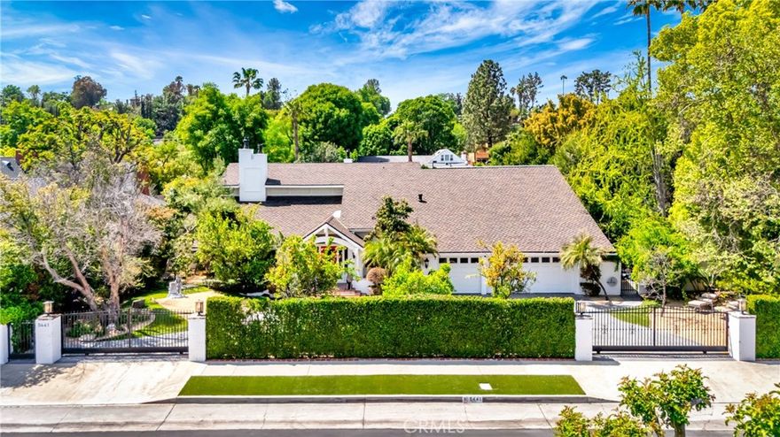 Gated and Remodeled Tennis Estate. Great Opportunity Tarzana South. Circular Driveway, Large Lot 23,329 SQ. FT.+5 BD+5.5 BA+ Guest House + North/South Lighted Tennis Court. Open Floor Plan w/Gorgeous New Kitchen, Huge Island, Two Dishwashers, Two Sinks. Two Laundry Rooms, Formal Dining, Living Room, Family Room w/Wet Bar and Fireplace. Aquarium Wall Between Family Room and Home Theater, Large Master Suite w/Two Separate Baths, Walking Closets and Steam Room. Sprawling Grounds w/Lawn, Flagstone Patios, Pool, Spa, Dry Souna, Putting Green, Firepit, BBQ, Vegetable Garden, Mature Fruit Trees, Solar System, Emergency Generator. OWC.
