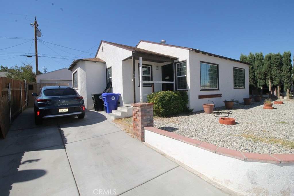 Step into this renovated gem ready for you to call home! This stunning 4-bedroom, 2-bathroom residence has both modern comfort and classic charm, making it ideal for you. Fenced front yard offers both privacy and curb appeal. Fresh, inviting interior, with brand new flooring and freshly painted walls that create a bright and welcoming atmosphere throughout. The spacious living area is perfect for gatherings as we prepare for the up-and-coming holidays, while the fully equipped kitchen features new countertops that make meal prep a joy. With brand new toilets and plush new carpeting in the bedrooms, every detail has been meticulously attended to, ensuring your comfort and convenience. A full-length patio invites you to savor the warm desert evenings. Picture yourself hosting barbecues, enjoying morning coffee, or simply relaxing under the stars in your private outdoor retreat. The fenced yard provides a safe space for pets to play freely. And let’s not forget one of the rarest finds in Barstow—central air conditioning! Beat the heat and stay cool all summer long while enjoying the comfort of your new home. Don’t miss this incredible opportunity to own a beautifully updated property that’s moving ready and waiting for your personal touch. Schedule your showing today and step into a life of comfort, convenience, and endless possibilities!