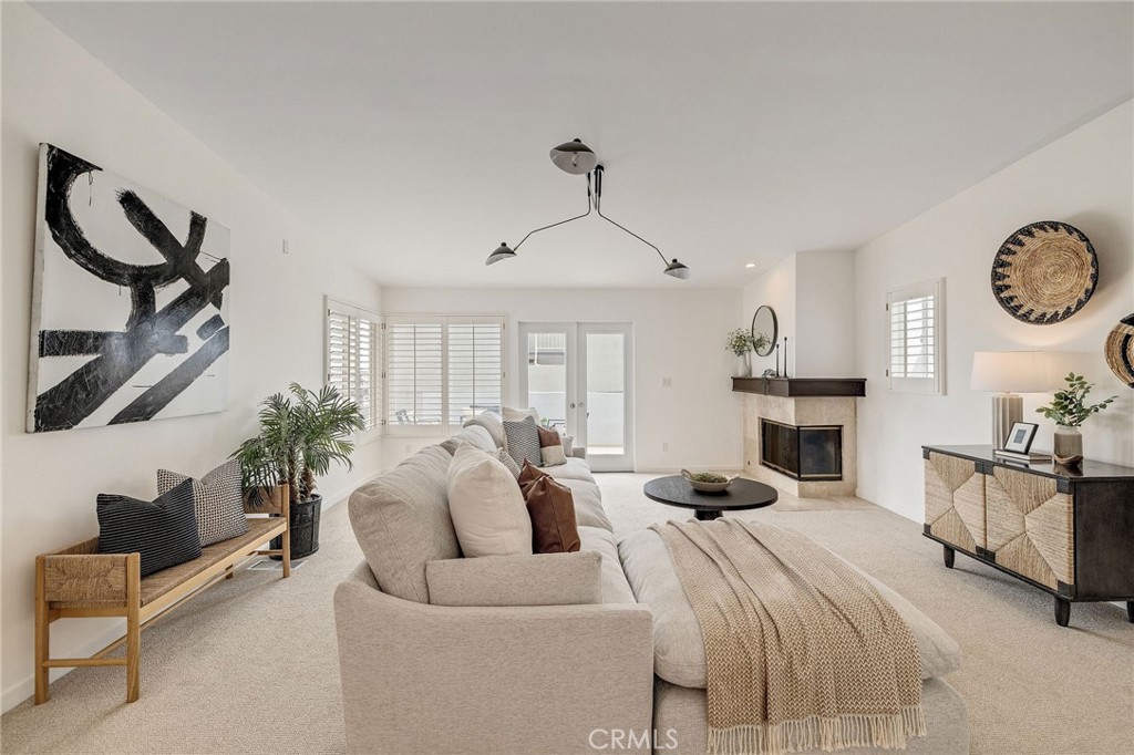 Major $200k price improvement. Lowest priced 3 bedroom with ocean views in the Hermosa Sand Section. All new kitchen counter tops, hardware, all new paint, refinished hardwood floors, new lighting, and new carpet. Bulls eye Downtown Hermosa Beach Location. Park the car and walk to restaurants, shops and the beach 365 days a year! Coastal Living Meets Contemporary Luxury. Perched just blocks from the sand and the iconic Hermosa Beach Pier, this is a rare opportunity to own a modern coastal retreat in one of Southern California’s most desirable neighborhoods. This stunning residence blends sleek architectural design with breathtaking ocean views, all within walking distance of vibrant restaurants, boutique shops, and the famed Strand. Inside, you’ll find an open-concept living space with high ceilings, hardwood floors, and expansive glass doors that invite in natural light and ocean breezes. The gourmet kitchen has all brand new counter tops, hardware and refinished cabinets featuring top-of-the-line stainless steel appliances. The primary suite offers a serene escape with dual sink vanity, a spa-inspired bathroom, and walk in closet space. Additional bedrooms are spacious and bright, ideal for guests, family, or a home office. Enjoy sunsets from your private rooftop deck, complete with ocean views of the Pacific, Palos Verdes Peninsula, and beyond. A two-car garage and premium finishes throughout complete this exceptional coastal home. Whether you’re seeking a full-time residence or a luxurious beach getaway, 1429 Manhattan Ave delivers the ultimate Hermosa Beach lifestyle. Located in Award winning Hermosa Beach School District and Mira Costa High School.