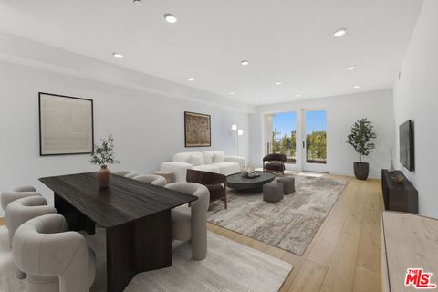 Photo of 505 S Barrington Avenue #304, Los Angeles, CA 90049 (MLS # 25511051)