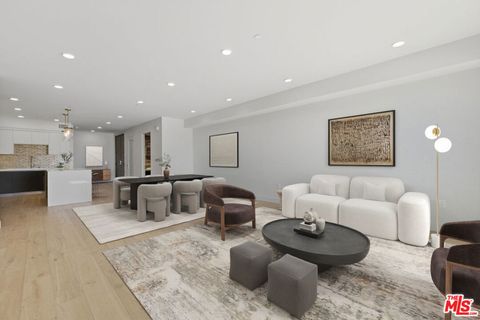 Photo of 505 S Barrington Avenue #304, Los Angeles, CA 90049 (MLS # 25511051)