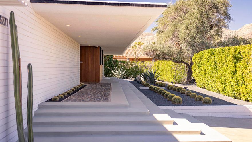 Paulette Johnson HausExperience timeless mid-century modern living in the heart of Palm Desert.Designed by renowned architect Walter S. White, this historic home exemplifies clean lines, floor-to-ceiling glass, and effortless indoor-outdoor flow -- the essence of desert modernism.This residence is fully furnished with custom designer interiors by Garrett and Garage. The chef's kitchen features high-end appliances, sleek cabinetry, and an open layout perfect for entertaining. Two spacious bedrooms and two elegant baths offer comfort and privacy, while expansive glass walls frame dramatic mountain views, palm trees, and tranquil water features.The grounds are equally impressive:- Private pool and hot tub with shaded lounging areas- Covered cabana for outdoor dining- Bocce ball court and putting green for leisurely afternoons - Multiple fire pits for warm desert evenings under the starsLocated just minutes from El Paseo's world-class shopping and dining and only steps from The Living Desert and hiking trails, this home blends architectural pedigree with modern luxury -- an ideal retreat for discerning tenants seeking privacy, style, and convenience.