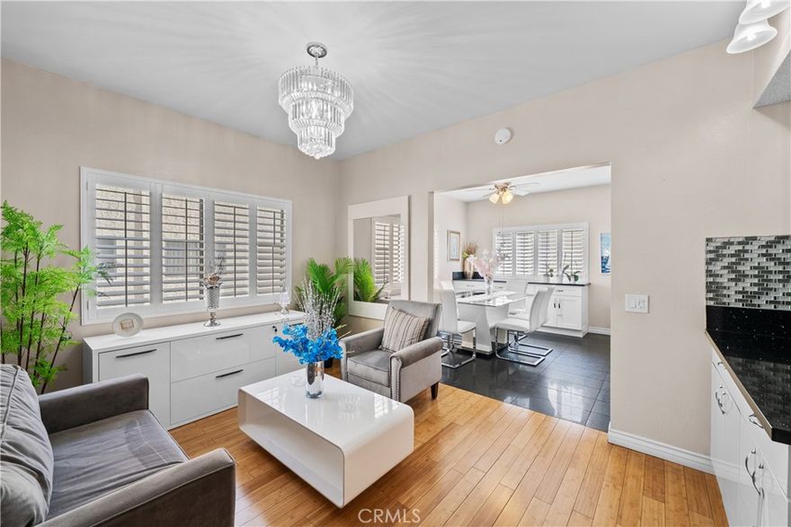 Step inside this spacious end-unit private townhome in this gated communitywhich blends space, light, and everyday convenience. The main level opens to an inviting spacious living room anchored by a fireplace and rooms with lots of natural light and open space, flowing to a dedicated dining area and a thoughtfully planned and upgraded kitchen with abundant storage and prep space. A sunny breakfast nook makes weekday mornings easy. Head upstairs to find three comfortable bedrooms provide flexibility for sleep, work, or guests, served by three bathrooms. The attached 3-car garage offers direct interior access and an in-garage laundry area—rare at this price point. Head outdoors to find a private patio perfect for grilling or unwinding al fresco. Community amenities include a sparkling pool, spa, BBQ area, and grassy commons for morning safe and tranquil strolls or playtime with pets. With quick access to major corridors, neighborhood shopping, and local eateries, this turn-key end unit private large updated townhome delivers comfort, convenience, and preferred private community living in a great San Fernando Valley location.