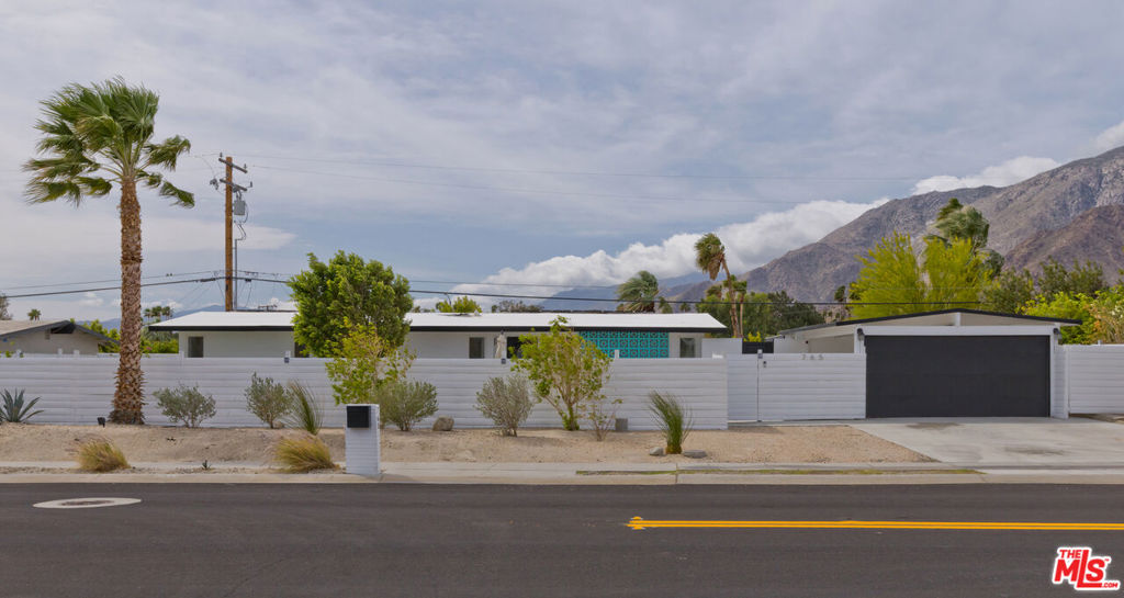 Welcome to Palm Springs, 3 bedroom and 2 bath home that has been recently remodeled with an amazing pool with outdoor deck and dining area on a beautifully manicured 10,018 square foot lot. enjoy the views of the mountains and sunsets or take a walk in the beautiful city for great entertainment and dining. home has an open concept for the kitchen, dining area and living room, separate laundry room and extra space for storage, all bedrooms have ample closet space, home is sold fully furnished, solar panels are paid for, if in need of an additional room storage behind the carport can Potentially be converted. The home is currently being used as a short term rental and can be sold with those reservations in place. make an appointment to come see this beautiful home today