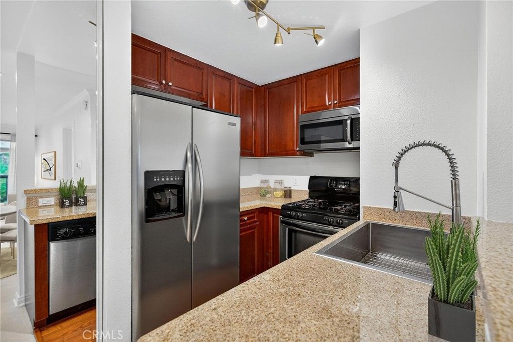 Photo of 5540 Owensmouth #209, Woodland Hills, CA 91367 (MLS # SR25245148)