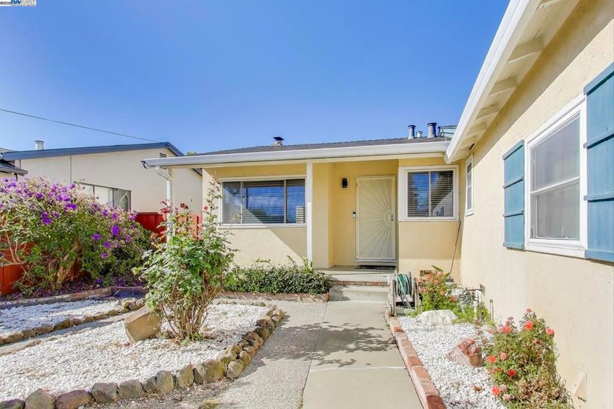 Welcome to this charming and highly sought-after San Leandro residence nestled in the desirable Washington Manor district. This single-level beautiful home offers a bright and inviting floor plan filled with abundant natural light. Located near top-rated San Leandro and San Lorenzo schools, it’s perfect for families and commuters alike.  Step inside to discover an open-concept living and dining area featuring a cozy wood-burning fireplace and gleaming natural hardwood floors. The main home includes 3 spacious bedrooms and 2 full bathrooms, providing comfort and functionality. An added bonus studio unit at the back of the property—ideal for a home office or guest space " Permit unknow" . Altogether, the home offers 1,545 sq ft of living space on a generous 5,712 sq ft lot.  Enjoy the convenience of a two-car side-by-side garage and the peace of mind that comes with being in the 94579 zip code, which does not require flood insurance.  Located minutes from BART, I-880, I-580, parks, restaurants, and more—this is a rare opportunity you won’t want to miss!