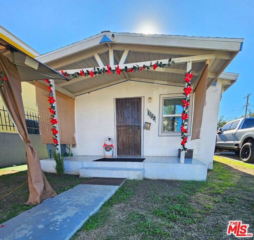 Thank you for exploring this unique investment opportunity in Los Angeles with potential for high return or growth. This lovely detached duplex sets on 5,054 lot, the property features, front house 3 bedrooms and      1 1/2 baths, Rear house 3 bedrooms and 1 1/2 baths, fence enclosing front and rear yard.  This investment provides rental income making  it great for investors or families wanting close proximity but independence.