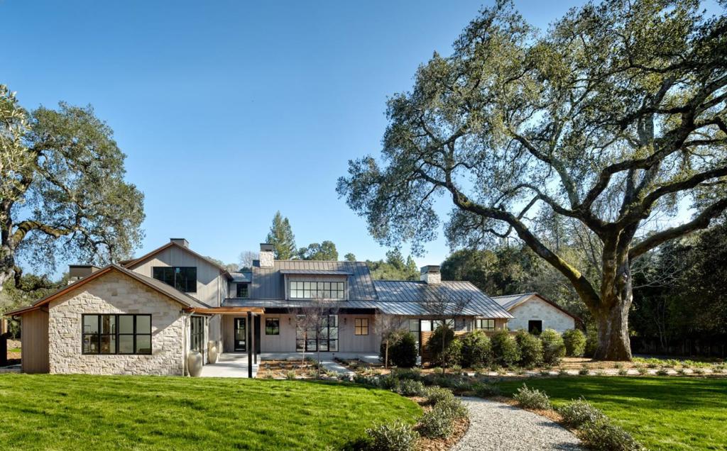 Located on one of central Woodside's most exclusive private roads, this stunning newly constructed ~12,500 sq ft country estate is framed by over 4 acres of lush landscaping, heritage oaks and a picturesque olive grove. State of the art fully automated 3 level main residence (~9400 sq ft) features 5 br plus separate office/guest room (all en-suite), gourmet kitchen plus separate back kitchen, elevator, entertainment room and home theatre, 2000+ bottle temperature-controlled wine room and heated exterior living room overlooking the pool and spa in an expansive private park setting. Two garages (6 car) with ample off-street parking, 3 stall barn, large flat grassed play area and spacious 2 br, 2 ba guest cottage accessible by second private gated driveway.