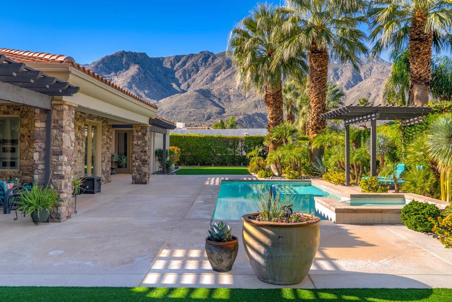 Located in the gated community of Parc Andreas, this 4-bed, 5-bath home offers 3,624 sq ft of generous living space on a private .35-acre lot. The floor plan features formal living and dining, a spacious great room, and multiple doors that open to the pool, spa, and mountain views. All bedrooms are ensuite, including a large primary suite with garden access. High ceilings, flooded with natural light. Excellent storage in 3 car garage including two walls of cabinets. A rare opportunity to own in Parc Andreas, one of south Palm Springs' most sought-after neighborhoods.