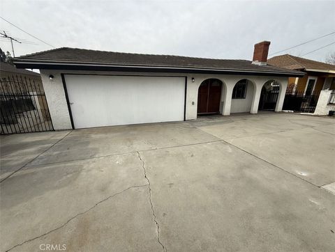 Photo of 209 N Stimson Ave, La Puente, CA 91744 (MLS # CV26016230)