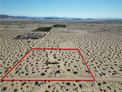 Photo of 675 Pampas Avenue, 29 Palms, CA 92277 (MLS # JT26075873)