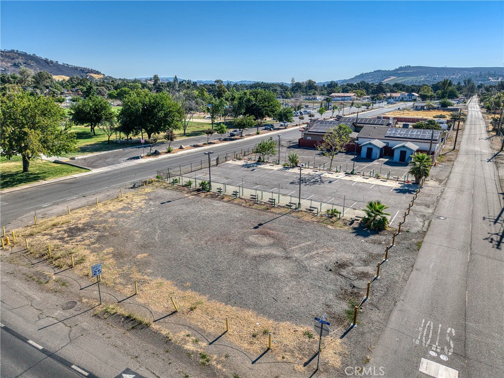 Need a great commercial location. .5 Acres of high exposure commercial land in the heart of downtown Clearlake. This flat parcel already has electricity, water and sewer connected, saving time and money. Currently being used as a parking lot but it has potential for much more. Walking distance to the city park, the lake, restaurants and shops. This could be one of the best land buys in Clearlake.