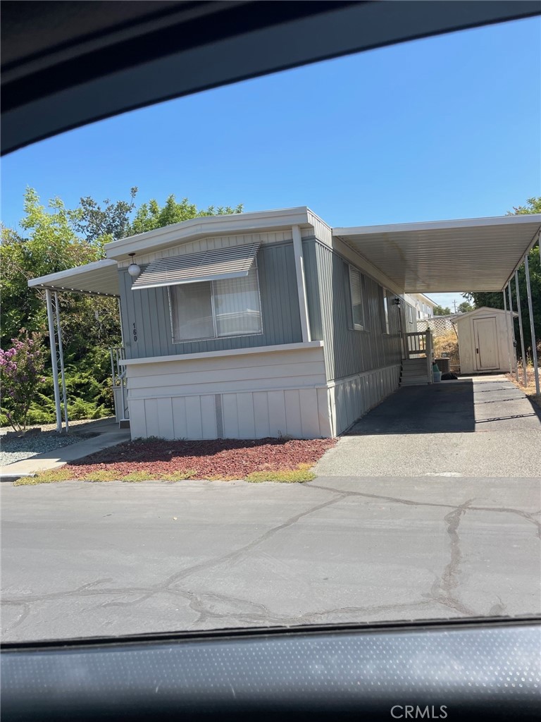 Located in one of Oroville's Finest 55+ Mobile Home Park, is a darling 1 bedroom, 1 bathroom with a lot of recent updates. Newer interior/exterior paint, flooring, counters and fridge. This location is 2 minutes to the Clubhouse, in-ground heated pool, billiards room and fitness room. Laundry hookups are in the shed at the back of the carport.