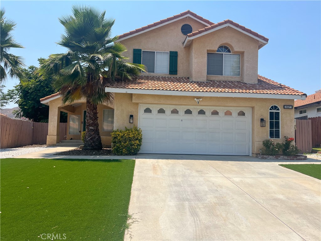 Welcome to this Beautiful Moreno Valley, Sunny mead Ranch home! This home Features 5 bedrooms total and 3 full bathrooms. One bedroom is conveniently located downstairs with a full bathroom available to it for convenience. the home features Floors throughout the downstairs and carpet upstairs for low noise and comfort. the beautifully renovated kitchen includes all appliances and is open to the den and dining area right next to it and an area for stools to eat on the counter top. With 4 bedrooms upstairs, including the master bedroom with plenty of closet space and a renovated bathroom with a soaking tub for those relaxing nights and a his and hers vanity section. The 3 other bedrooms feature a den to store office space, tv area or toy area, choice is yours. The house has turf grass for ease of maintenance in the front and backyard, so you will have green grass all year long. The House also includes Solar panels which will help keep your electric bill at a lower cost. Home is in the Sunnymead Ranch Community which features access to the gym, lake, courts, pool spa and much more. Make this your home to live in comfort and with many amenities available for your enjoyment.