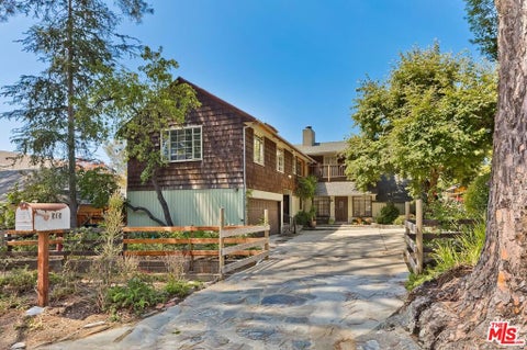 Photo of 515 N Kenter Avenue, Los Angeles, CA 90049 (MLS # 26868353)