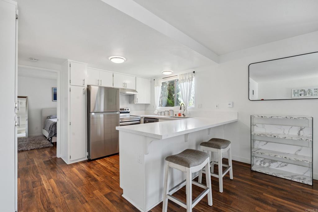 Do not show without a confirmed appointment. Welcome to 155 Rosebay Dr #31, a charming coastal condo nestled in the heart of Encinitas. This beautifully updated 1-bedroom, 1-bath lower-level corner unit offers a light and airy feel with west-facing windows that invite in natural sunlight and ocean breezes. Enjoy modern upgrades throughout, including updated flooring, contemporary finishes, and a refreshed kitchen perfect for casual dining or entertaining. The open-concept layout makes the most of its 630 sq ft, creating a cozy yet functional living space. Located in the tranquil Rosebay Falls community, you’ll find lush landscaping, peaceful water features, and a scenic deck with peek-a-boo ocean views. Just minutes from Moonlight Beach and vibrant downtown Encinitas, the location is ideal for enjoying the laid-back Southern California lifestyle. The condo includes covered parking and low HOA dues, making it a perfect fit for first-time buyers, investors, or those seeking a relaxing beachside retreat. Don’t miss the opportunity to live near the coast in one of San Diego’s most desirable communities