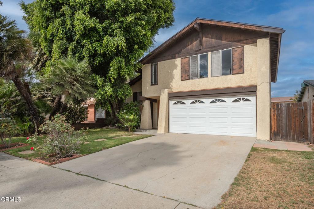 Welcoming family home in Winnetka! This 3 bedroom, 3 bathroom home offers a large living area with cozy, sunken fireplace area and newer carpet that flows into the dining room area featuring a wall full of windows looking out onto the backyard. The newer kitchen boasts plenty of storage and includes stove, refrigerator, dishwasher, solid surface countertops, desk area and wood like floors. Backyard has lush foilage and a mature orange tree, large grass area and raised stone planter. Extra large pergola was nearly rebuilt in October 2025 during termite repairs and is newly painted, concrete patio and pass through window to kitchen. There is a den off of the kitchen that could be converted into a 4th bedroom. Upstairs, the primary bedroom is oversized with white shutters, freshly painted ceiling and en suite bathroom. Two additional bedrooms and a guest bathroom complete this home.