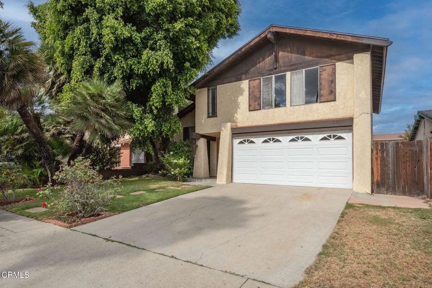 Welcoming family home in Winnetka!  This 3 bedroom, 3 bathroom home offers a large living area with cozy, sunken fireplace area and newer carpet that flows into the dining room area featuring a wall full of windows looking out onto the backyard.   The newer kitchen boasts plenty of storage and includes stove, refrigerator, dishwasher, solid surface countertops, desk area and wood like floors.  Backyard has lush foilage and a mature orange tree, large grass area and raised stone planter.  Extra large pergola was nearly rebuilt in October 2025 during termite repairs and is newly painted, concrete patio and pass through window to kitchen.  There is a den off of the kitchen that could be converted into a 4th bedroom.  Upstairs, the primary bedroom is oversized with white shutters, freshly painted ceiling and en suite bathroom.  Two additional bedrooms and a guest bathroom complete this home.