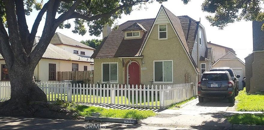 Cute rehab 1936 English Tutor home 2 bedroom 2 bath plus office/study room, granite counter tops throughout,  hardwood flooring, recent PEX plumbing, arch doorways, fireplace, white picket fence, stone Santa Maria BBQ pit in backyard 1140 sf, 1 car detach garage.