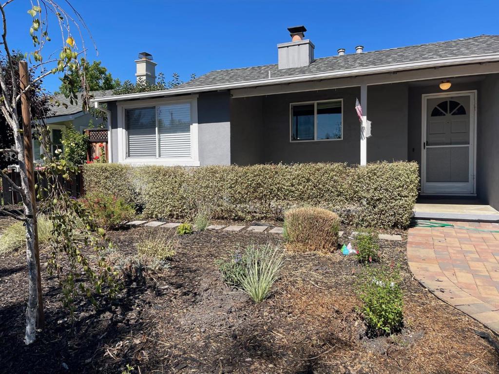 Bright and beautiful well maintained house in desirable Santa Clara neighborhood. Updated kitchen with granite counter top, ample kitchen cabinets, LED ceiling lights, stainless steel appliances, built-in microwave oven, dishwasher and refrigerator. Both bath rooms elegantly remodeled with custom design tile walls and flooring. Large Master Bedroom has two windows and mirror closet doors. Laminated wood flooring throughout. Double pane windows and sliding door. Large living room with fireplace, recessed lighting and access to wood deck patio and the lush backyard. Ideal for quiet relax retreat or entertainment. Large landscaped lawn area, vegetable/flower bed planters , many fruit trees ( Orange, Apple, Persimmon, Apricot, Cherry trees, and Lemon ) Centrally located, close to excellent schools, Central Park, library, shopping and transportation. Near Lawrence Expressway and San Thomas Expressway, easy commute to major Silicon Valley high tech companies. 2-car attached garage with washer /dryer provided, Level 2-EV charger, Whole house water filtration systems. 2-y new HVAC.