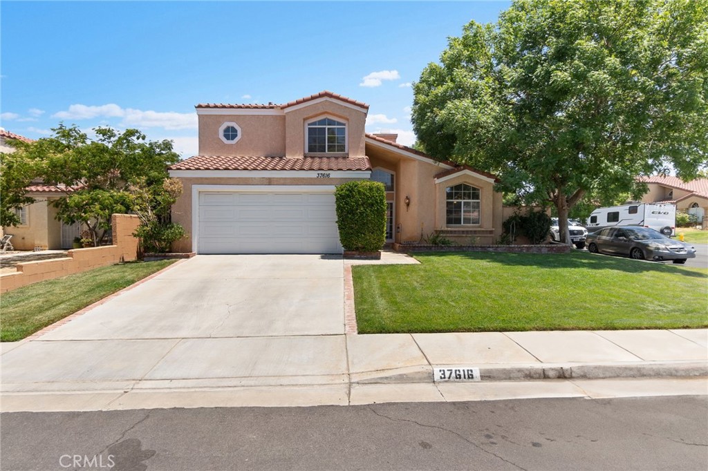 Stunning Corner Lot Home in Prime Palmdale Location!!Welcome to this beautifully updated and well maintained 4-bedroom, 3-bathroom home, proudly offered for the very first time! Perfectly situated on a desirable corner lot, this residence is surrounded by lush, manicured landscaping—offering exceptional curb appeal and a tranquil setting you'll instantly fall in love with.Step inside to a light-filled interior freshly painted throughout, where high ceilings and an open-concept layout create an airy, welcoming atmosphere. The living and dining areas flow effortlessly, making this home perfect for both relaxed living and stylish entertaining.At the heart of the home is the spacious kitchen, complete with pristine countertops, abundant cabinetry, and a charming window view to the front yard—perfect for enjoying your morning coffee while soaking in the peaceful scenery.Ideal for guests or a home office, the first-floor bedroom and full bathroom offer flexibility and privacy. Upstairs, you’ll find three additional generously sized bedrooms, each offering ample closet space and comfort.Step outside to your private oasis—a beautifully landscaped backyard that’s perfect for entertaining or simply unwinding after a long day. Whether hosting summer barbecues or enjoying quiet evenings under the stars, this outdoor space is designed for making memories.This move-in-ready gem offers the perfect blend of comfort, style, and function—making it a rare find in today’s market.
Don’t miss the opportunity to make this Palmdale beauty your forever home.
